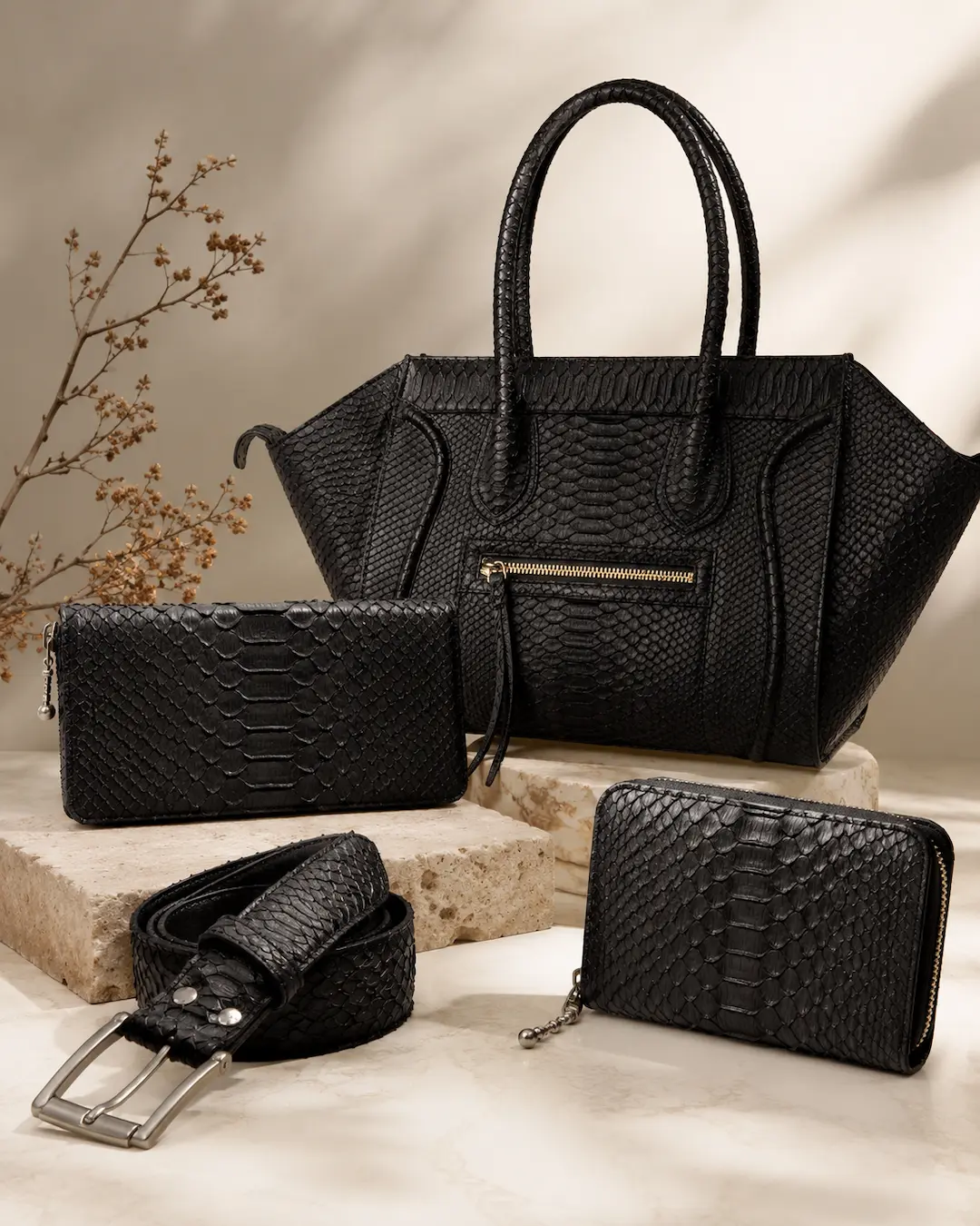 Black leather bags, wallets and belts for men